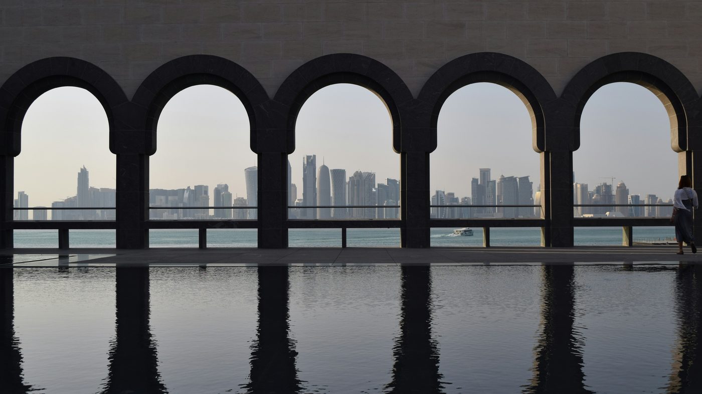 Museum of Islamic Art arches overlooking the Doha skyline